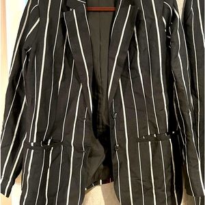 Two piece black and white linen suit … lined.  Excellent condition